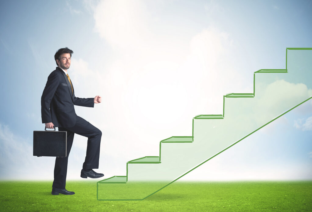 A professional with upward mobility climbing the stairs
